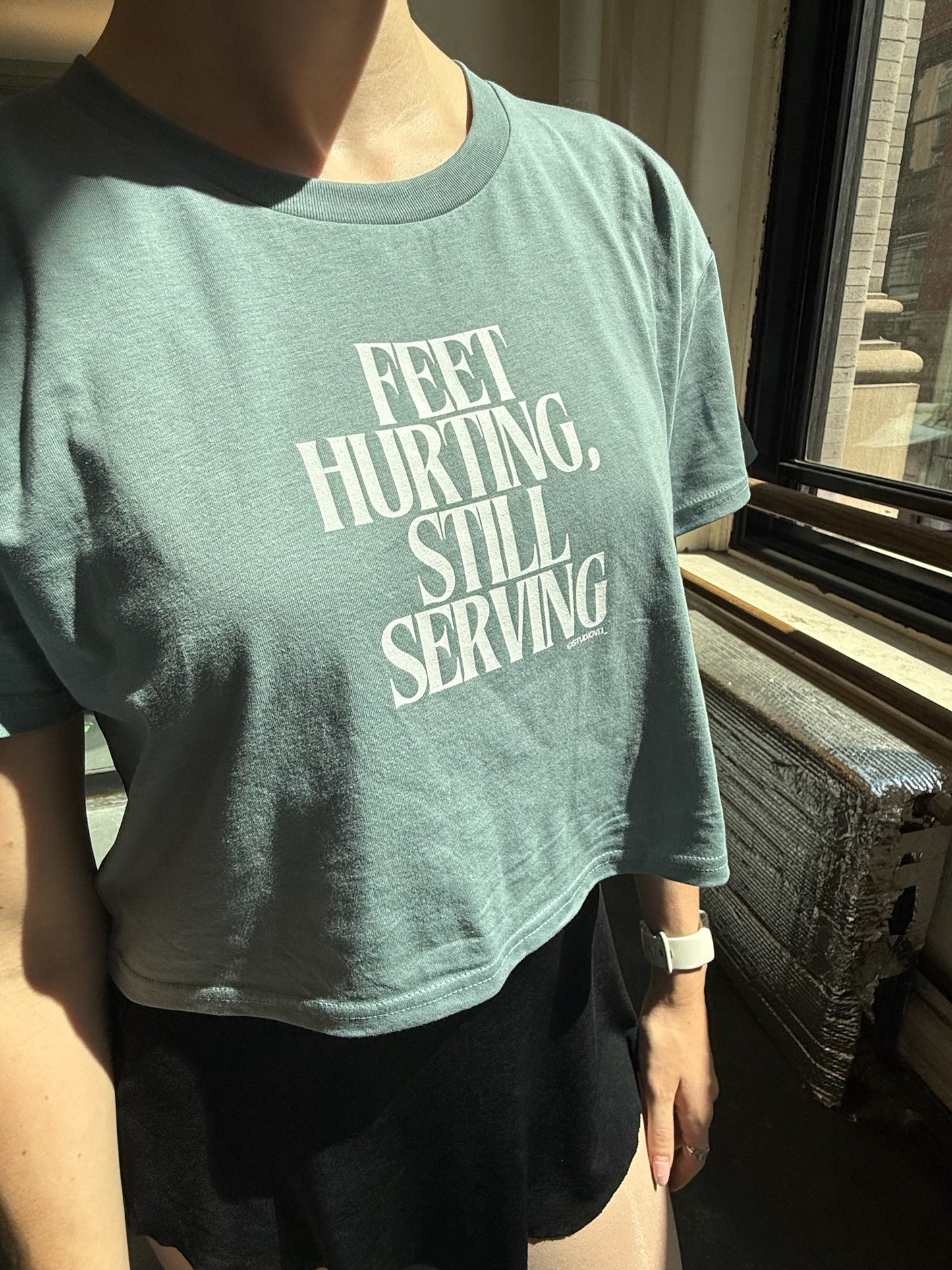 FEET HURTING, STILL SERVING Woman's crop top